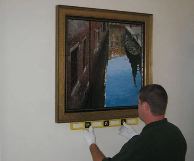 Premium fine art installation in a designer showroom showcasing meticulous handling
